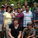 Group photo of CoCoDA delegates with Salvadorans in Aquacayo, El Salvador